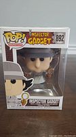 Front view of the Inspector Gadget Funko Pop figure in original box showing character and number 892.