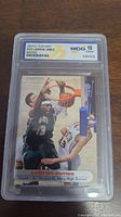 Front of encapsulated 2003 LeBron James Rookie Basketball Card graded WCG 10 Gem Mint