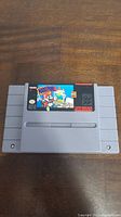 Front view of Super Nintendo Mario Paint cartridge with label.