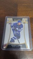 Front of 2019-20 Upper Deck Allure Rasmus Sandin rookie card showing player image and details.