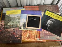 Photo showing several vinyl album covers stacked next to each other including The Mormon Tabernacle Choir and Berlin Philharmonic albums