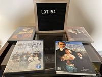 Four DVD sets displayed, including Sherlock Holmes collection, Onedin Line, Barchester Chronicles, and The Heiress.