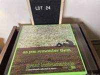Photo of the 3 LP record set cover front showing album art and title.