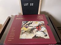 Maroon box with abstract art cover and gold text 'The Early Twentieth Century Concert' by Time Life Records.