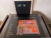 Boxed set of the 4 LP records titled 'The Music of Today' from The Story of Great Music series shown from top angle with lettering visible.