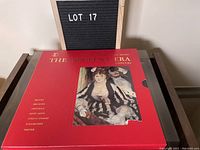 Front view of red box with artwork and listing of composers from 'The Opulent Era' classical music set