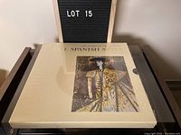 Front view of unopened boxed vinyl set showing artwork of figure in Spanish attire and gold text.