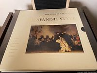 Front view of the cream-colored box featuring the title 'The Story of Great Music: The Spanish Style,' with an image of Spanish musicians and a dancer.