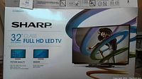 Box showing the Sharp 32 inch Full HD LED TV, model LC-32LB261U