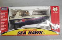 Photo of Nikko Sea Hawk RC boat in original packaging showing the boat and box art.