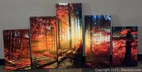 Five canvas panels lined up showcasing a colorful forest with red and orange leaves and sunlight in the background