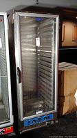 Front view of Howe food proofer with glass door and control panel at bottom.