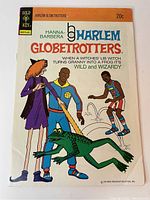 Front cover of the 1974 Harlem Globetrotters Comic #8, showing characters and title.
