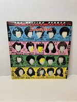 Front of colorful album sleeve for The Rolling Stones "Some Girls" showing album artwork and text.