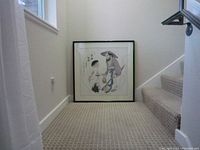Framed Asian-style painting of two figures standing, one with an umbrella, placed near stairs showing scale.