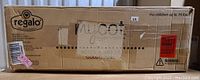 Boxed Regalo portable toddler bed cot with brand label, model, and weight limit.