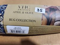 Photo of the product label showing brand VHC Brands April & Olive and reference number 35 on sticker.