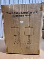 Photo of the retail packaging box for the Dungoo Touch Table Lamp set of 2 showing product image and label