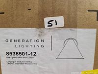 Close-up photo of the product label on the box showing the Generation Lighting brand, model 8538501-12, and product information including lamping details.