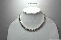 Full view of necklace on display bust