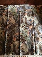 Full view of the square velvet tablecloth showing intricate peacock feather pattern with crochet lace edging.