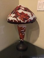 Full view of lamp unlit showing shade, stem and base