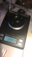 Digital scale showing the gemstone weight as 2.05 carats.