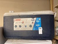 Photo showing the full cooler with brand name, capacity, and label visible.