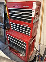Front view of red Craftsman two-piece tool chest, assembled top and bottom sections