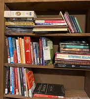 Overview of shelves with assorted religious, reference, and nutrition books. Includes titles on dating boundaries, Bibles, and more.