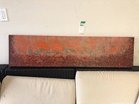 Horizontal rectangular canvas with abstract earthy tones in latex paint.