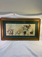 Front overall view of framed flower watercolor painting by L.M. Hare