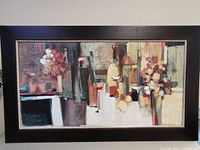 Full front view of the large abstract painting showing flowers, vases and geometric shapes in muted earth tones within a wooden frame.