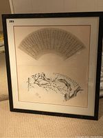 Front view of framed fan painting with calligraphy and plum blossom