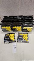 17 sealed packages of Nerf Rival Yellow High-Impact Rounds arranged in rows.
