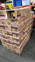 Stack of 221 sealed cardboard cases holding Nerf Rival ammo packs