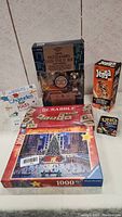 All items together showing the lot's range of family games and puzzle set