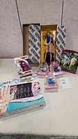 Barbie BMR 1959 doll in box with other toys and arts and crafts kit on table