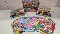 Full lot display showing all toys, puzzle box and sticker packs.