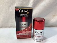 Front photo showing new in box Olay Regenerist Wrinkle Revolution Complex Moisturizer 50ml with bottle and packaging.