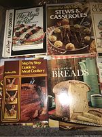 Cookbooks titled Valley's Family Cookbook, The Magic of Rice Cookbook, Wonderful Ways to Prepare Stews & Casseroles, and Cook Book of Breads.