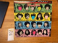 Front cover of The Rolling Stones vinyl album "Some Girls" showing stylized portraits and text.