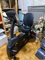 Full view of bike showing frame, seat, pedals and console