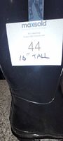 Close-up showing size tag displaying 44 and height measurement 16 inches tall.