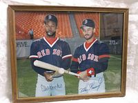 Full framed photo showing Ellis Burks and Mike Greenwell in Red Sox uniforms holding bats, showing overall condition and framing.