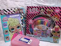 Two LOL Surprise activity sets side by side showing box artwork and included accessories.