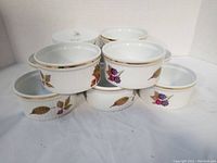 Set of 10 white porcelain ramekins with gold rim and colorful fruit and leaf decoration