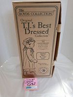 Original Boyds Collection box featuring T.J.'s Best Dressed 20th Anniversary Limited Edition artwork and text, listing the included bear names.