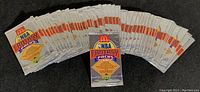 Fanned view of all unopened NBA Fantasy Packs laid out