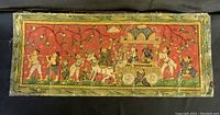 Full view of Patachitras painting showing deity Jagannath on chariot with attendants and decorative background.